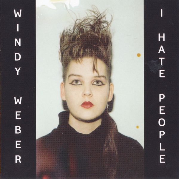 Portrait of Windy Weber, with makeup and hair style akin to punk style, with her name and album title on each left and right sides of the portrait